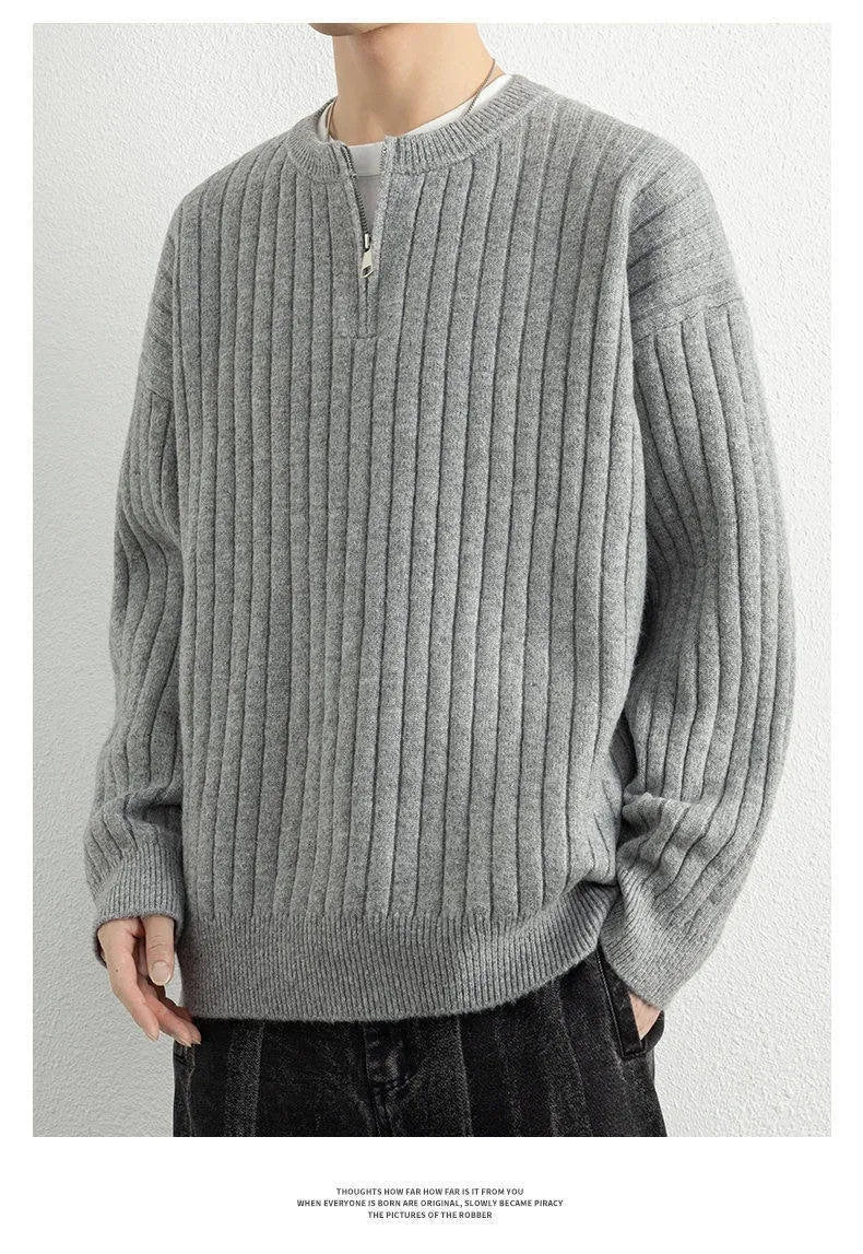 Men's grey half-zip textured knit sweater with loose fit design and long sleeves