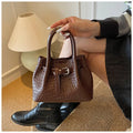 Women's PU messenger bucket bag in khaki with spliced design and three-dimensional outer pocket