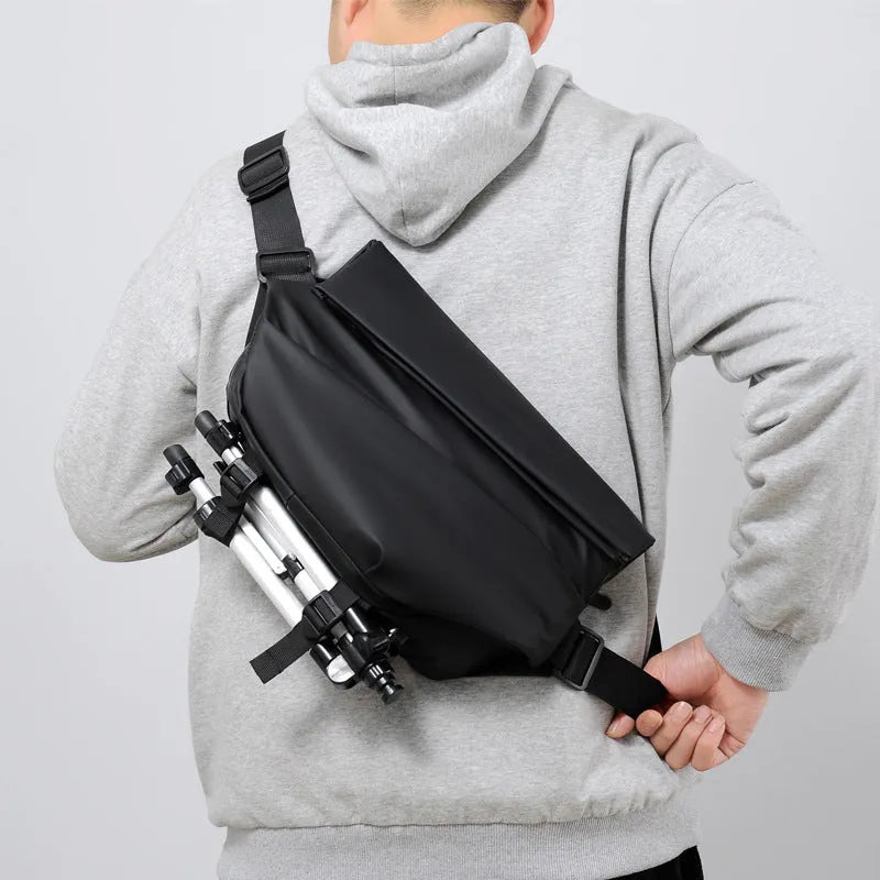 Grey PU crossbody bag showing shoulder strap and internal phone compartment