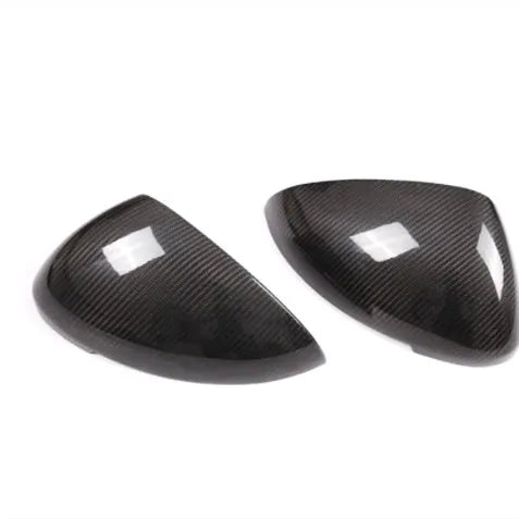 Black true carbon fibre rearview mirror covers for 14-22 Porsche Macan with dimensions 27.5x16.3x13.8 cm