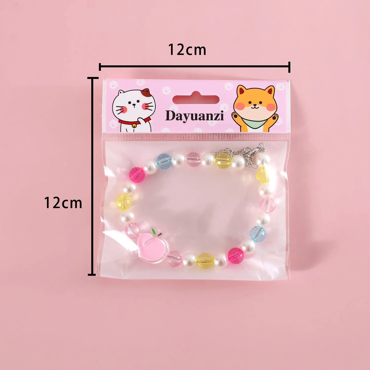 Colourful plastic pearl bead cat collar with a small flower charm on a white background.