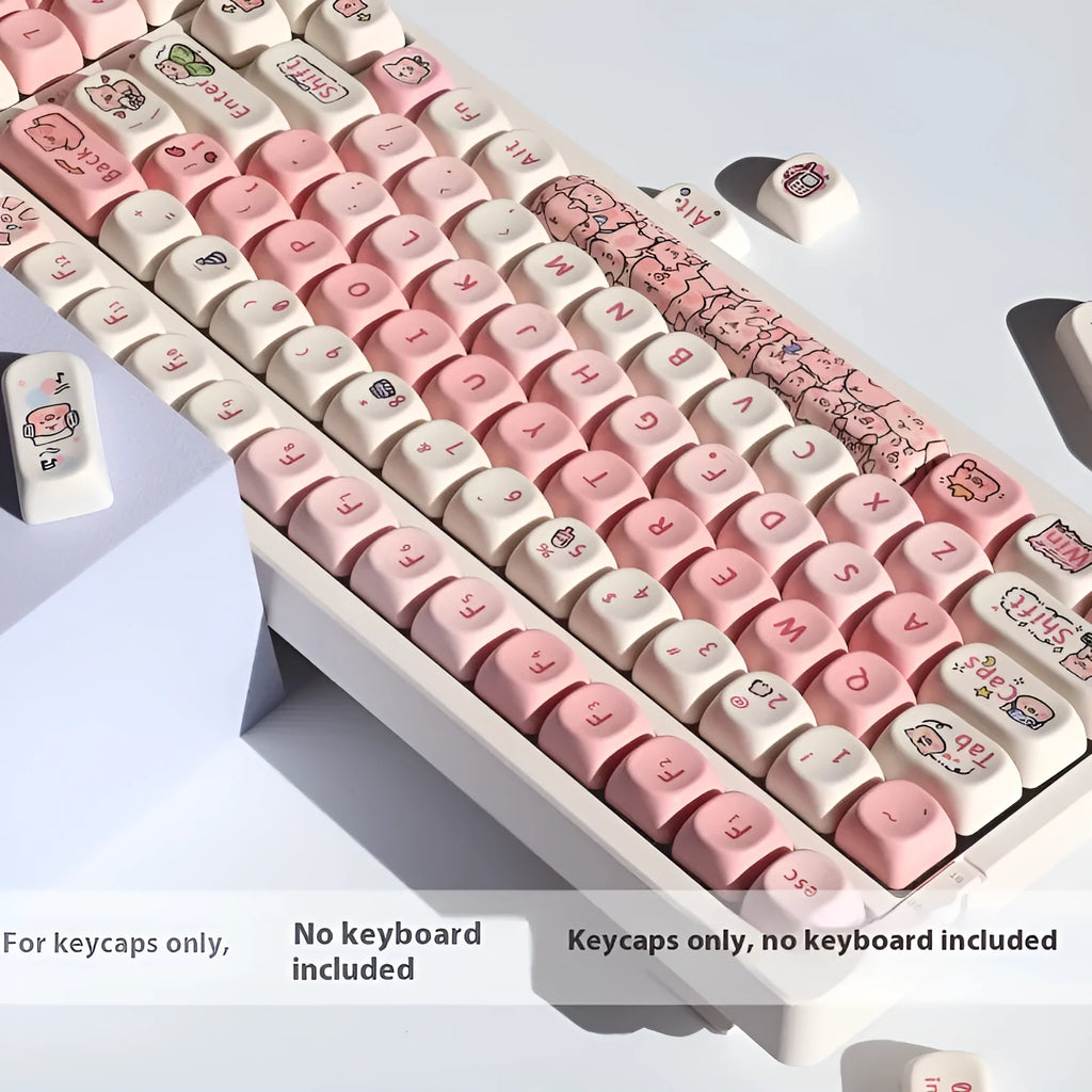 Pink mechanical keyboard keycap with a detailed fragrant pig design on all sides, shown next to a keycap puller tool.