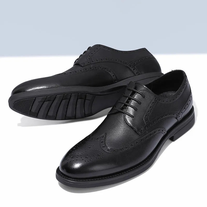 Men's black and brown brogue business shoes with classic detailing, shown from the side.