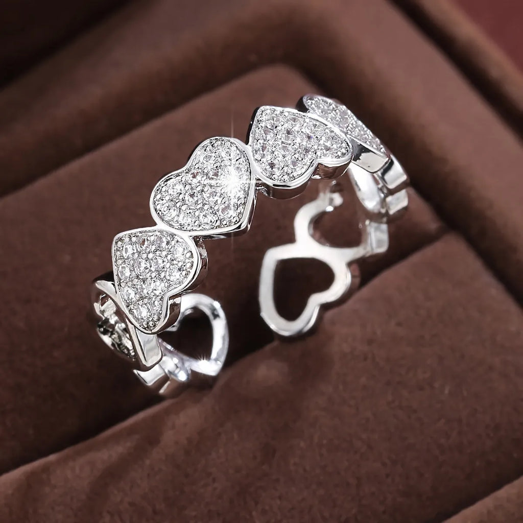Adjustable geometric love heart couples ring in gold colour with diamond-cut surface
