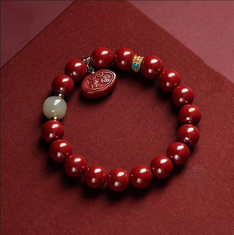 Cinnabar Emperor Sandstone bracelet with Ping An Fu Lu motifs in 8mm or 10mm bead sizes