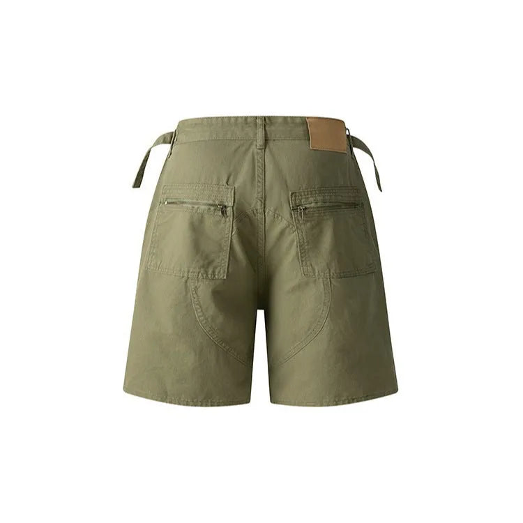 Retro loose-fit washed cotton shorts in grey, shown with a zipper and half elastic band.