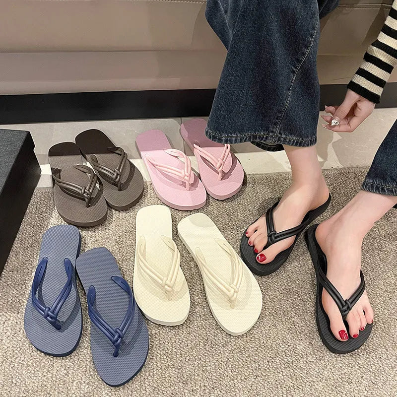Men's PVC flip flop slippers in beige with a toe-covering design and injection moulded sole.