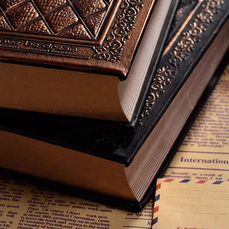 A5 notepad with textured embossed faux leather cover in bronze or black gold colour.
