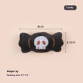 Small plush cat teaser wand with colourful eyes candy skull designs and feathers