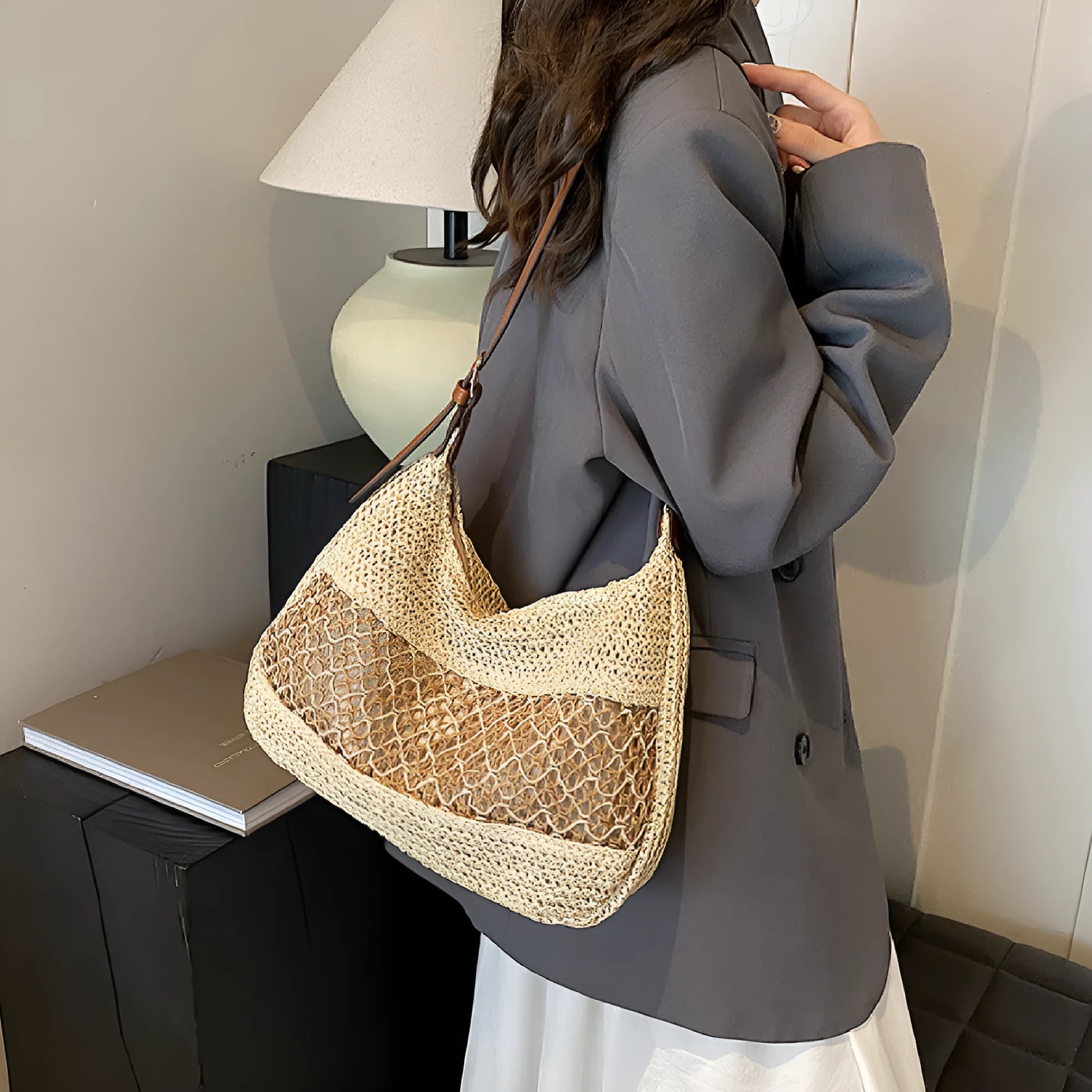 Women's casual straw cross body bag in horizontal square shape with sandwich pocket, shown in khaki colour.