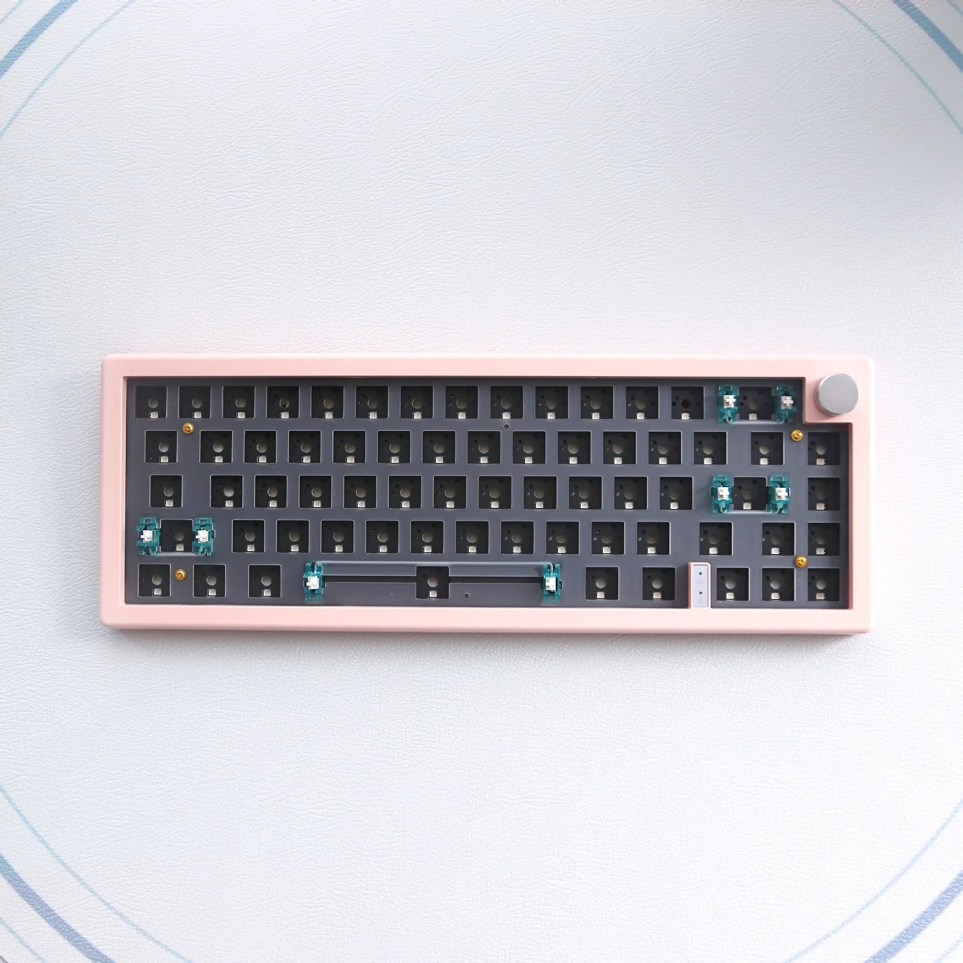 DIY mechanical keyboard kit with RGB backlighting and hot-swappable switches in multiple colour options