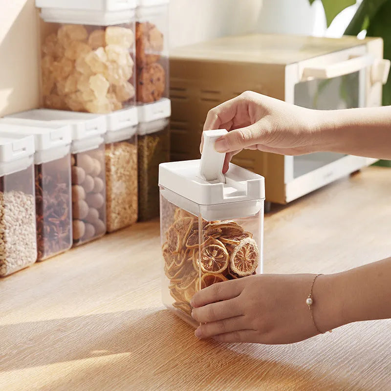 White transparent plastic storage tank for grains with lid measuring 10.9x10x7cm