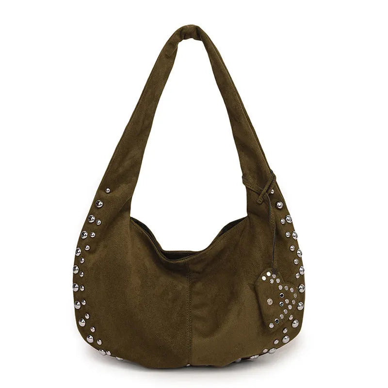Women's soft plush underarm tote handbag in retro styling showing black, red, brown and green colour options