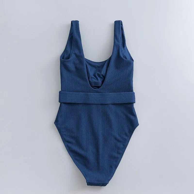 Navy blue women's one-piece slimming swimsuit with triangle design and chest pad