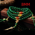 Natural green agate multi-circle bracelet on wrist, showing 8mm bead size.