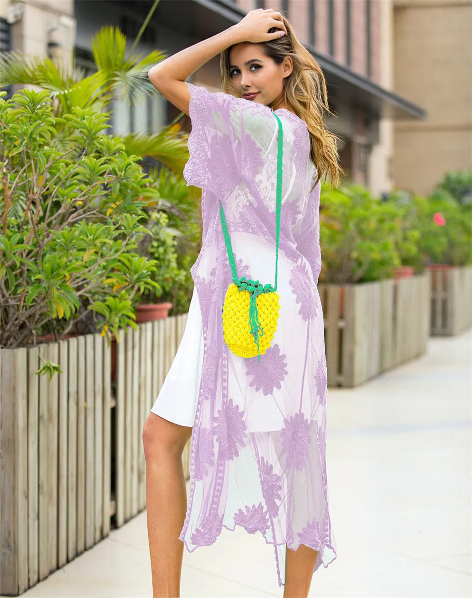 Light purple women's beach dress with lace embroidery detail, shown as swimwear cover-up