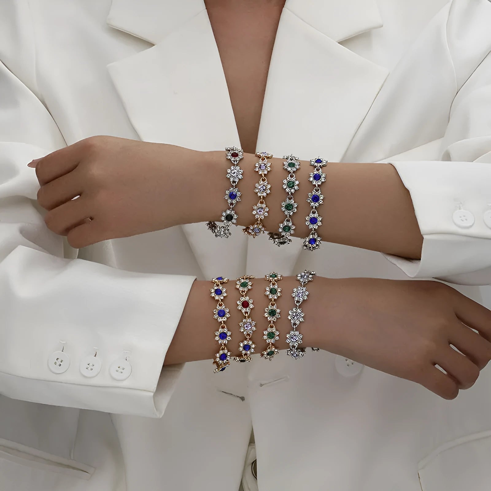 Close-up of a floral-shaped zinc alloy bracelet with an electroplated finish and crystal details.