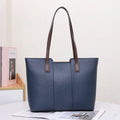 Women's genuine leather commuter shoulder bag in khaki colour showing box-type shape and shoulder strap
