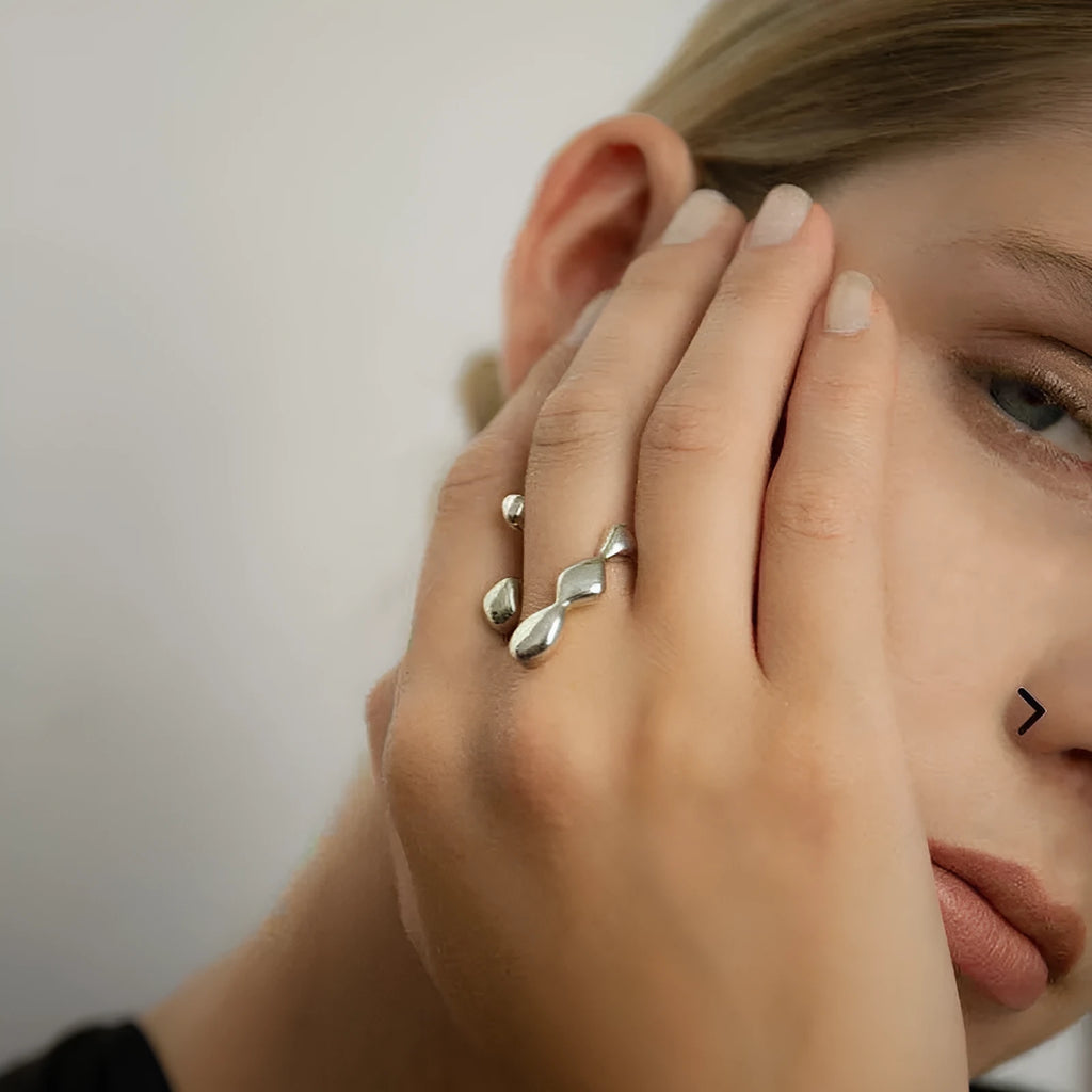 Brass women's ring with spherical design in gold and silver colour options