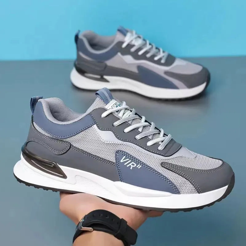 Men's colour block mesh casual running shoes in black, flat heel and round toe design.