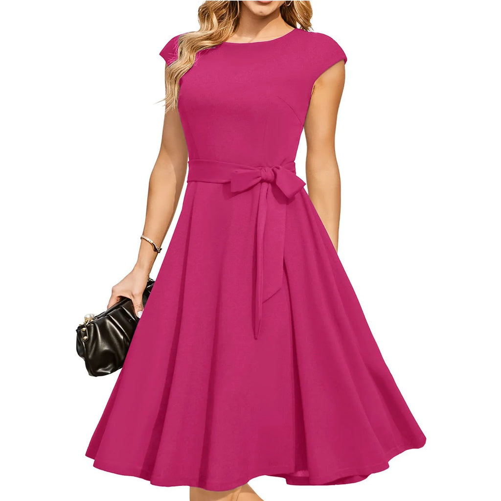 Sleeveless black dress with lace-up waist and a full, oversized swing skirt.