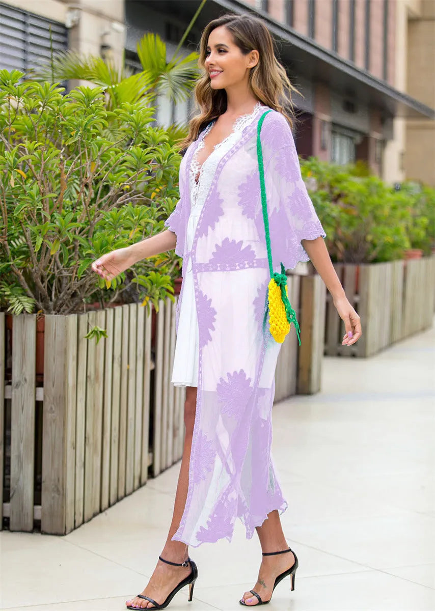 Light purple women's beach dress with lace embroidery detail, shown as swimwear cover-up