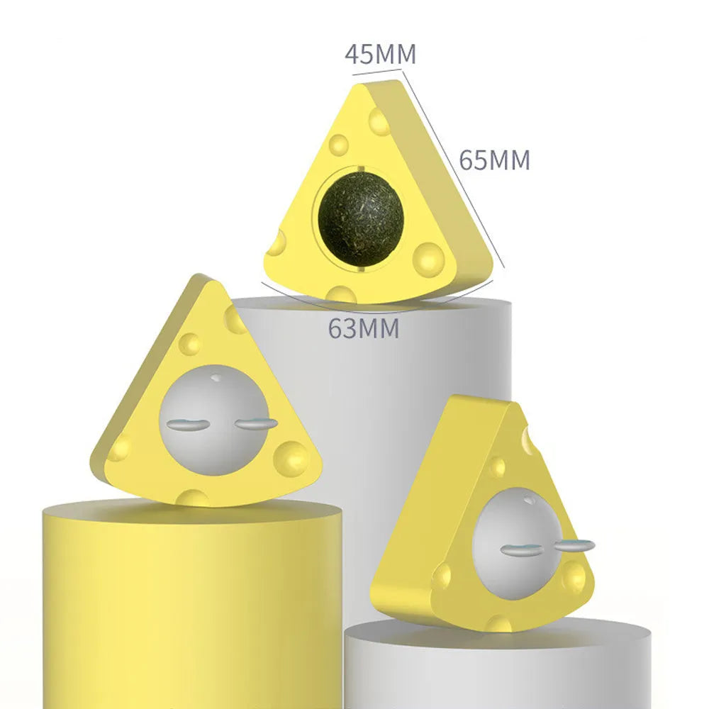Yellow cheese-shaped catnip toy balls with silvervine chew sticks for cats