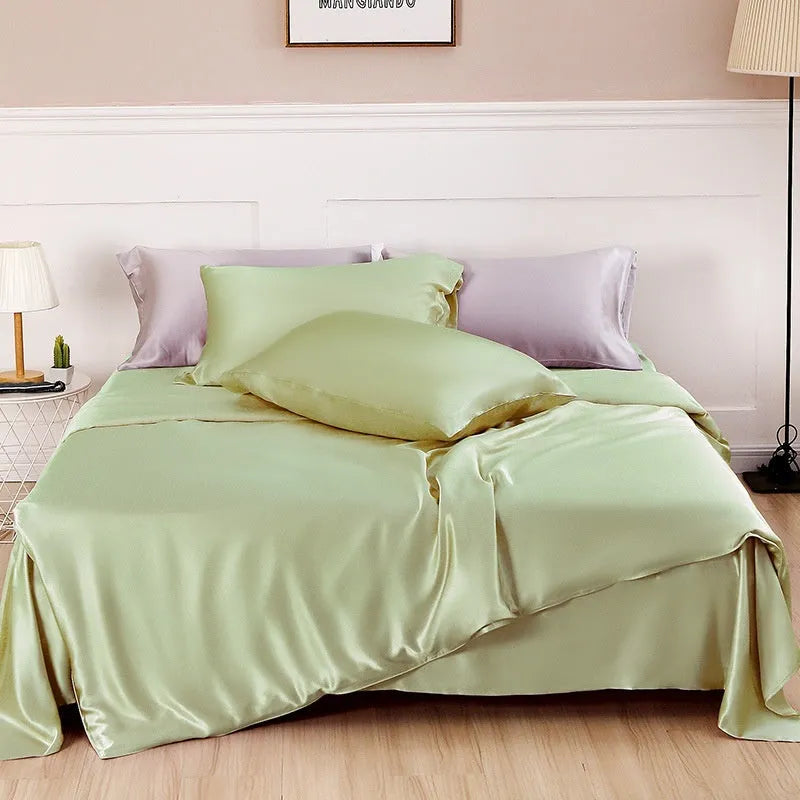 Solid colour silk duvet cover laid flat, showing double-sided construction and smooth texture.