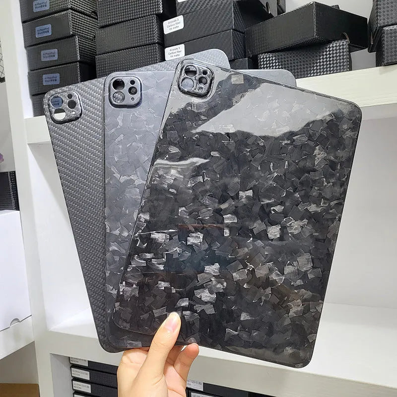 Genuine carbon fibre flat protective cover for Apple iPad Pro 11 with embossed plaid pattern.