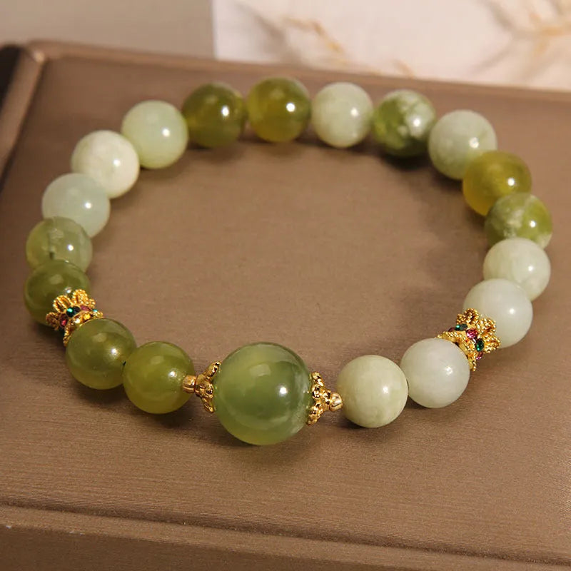 Women's genuine jade bracelet in Xiuyan jade green colour, mori-inspired original design.