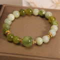 Women's genuine jade bracelet in Xiuyan jade green colour, mori-inspired original design.