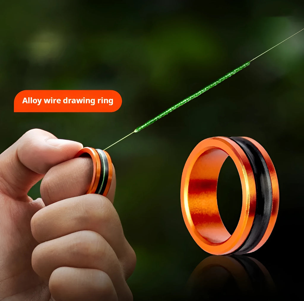 Orange and silver alloy fishing hand guard pull loop tool with non-slip grip.