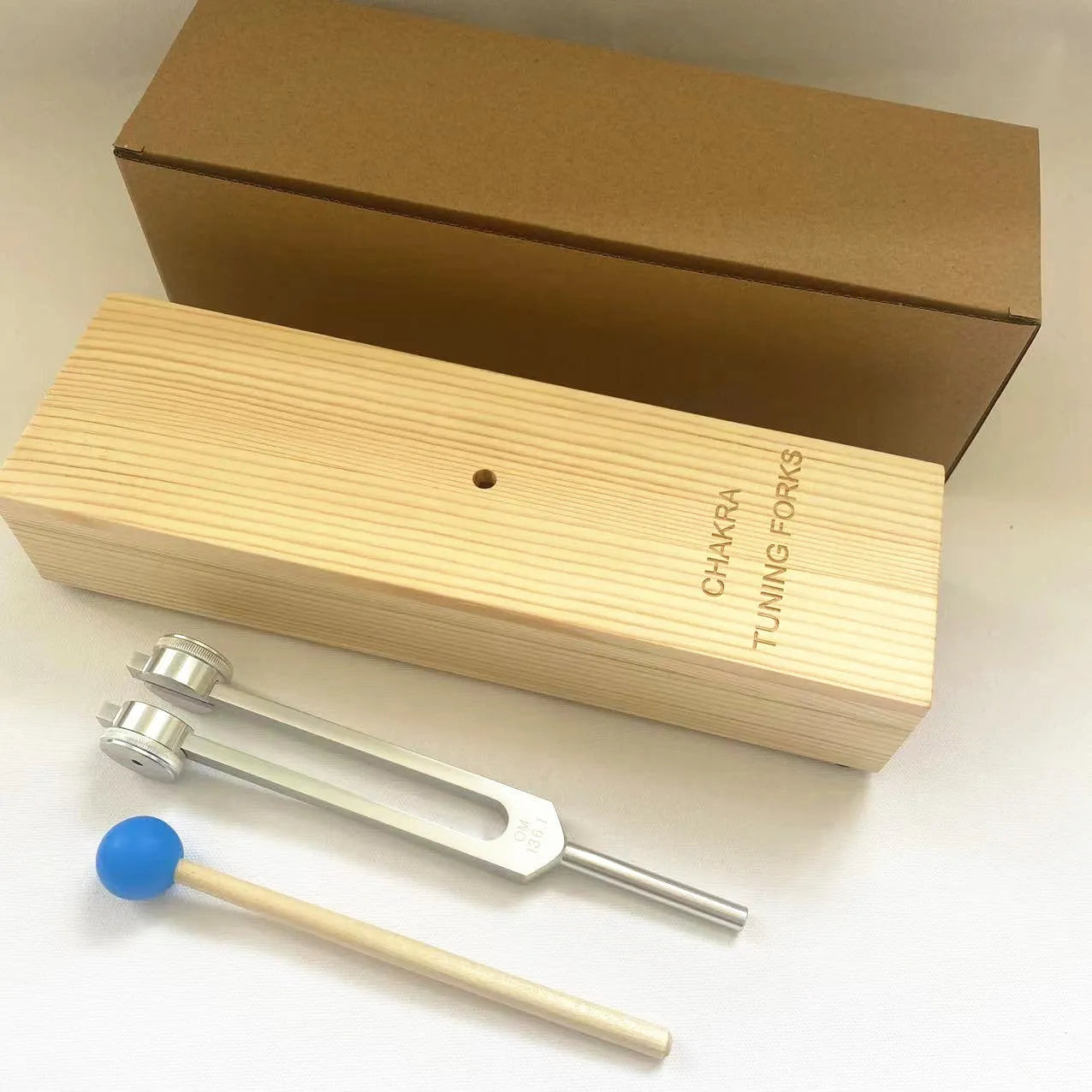 Aluminium alloy 432Hz tuning fork with speaker set in kraft paper box