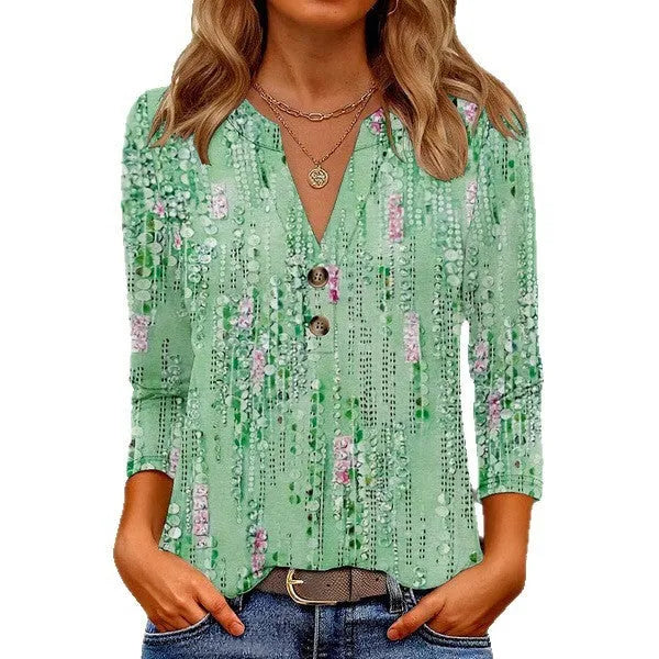 Women's loose fit V-neck top with 3D printed pattern in a casual style.