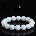 Natural blizzard snowflake crystal bracelet with round beads showing Ruyi and Xiangyun design elements
