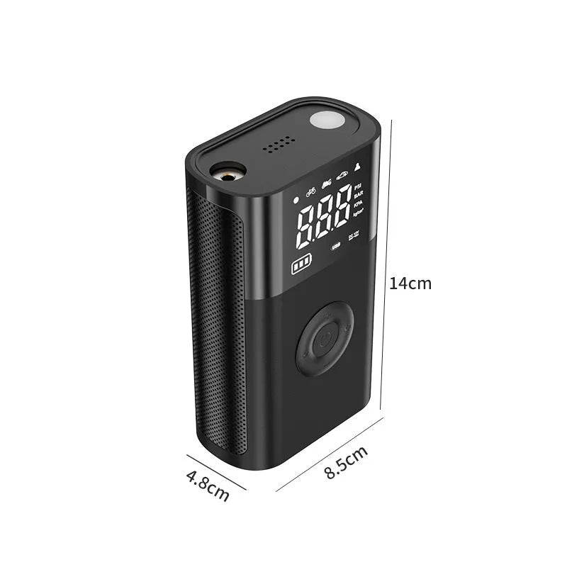 T2191-2 handheld wireless digital display air pump with LED light and multiple nozzle attachments on a table.