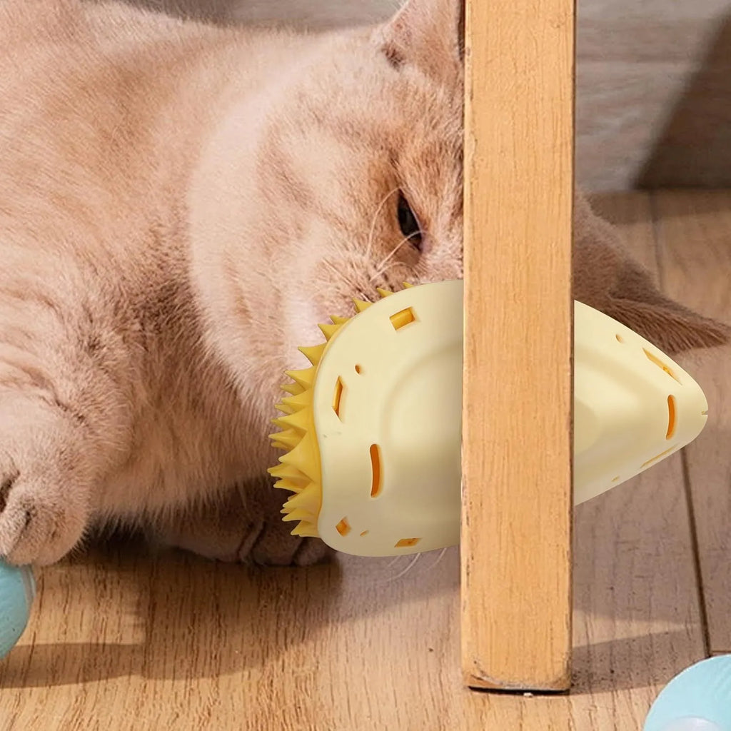 Yellow durian-shaped cat corner scratcher and massage comb with cat mint powder on a wall corner.