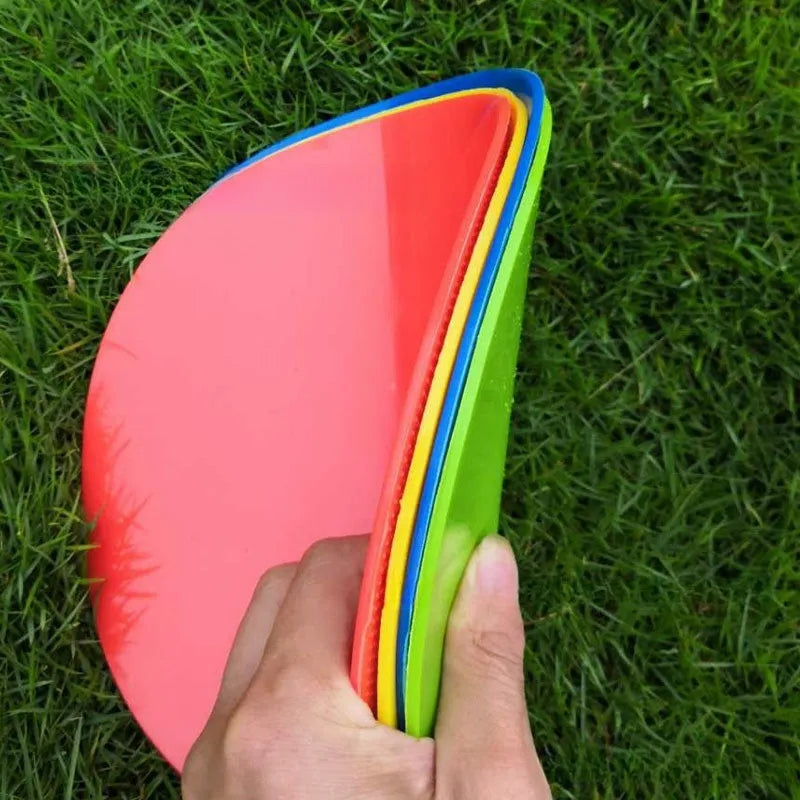 Football training target pad disc measuring 23cm in diameter with 3mm thickness in bright colour options