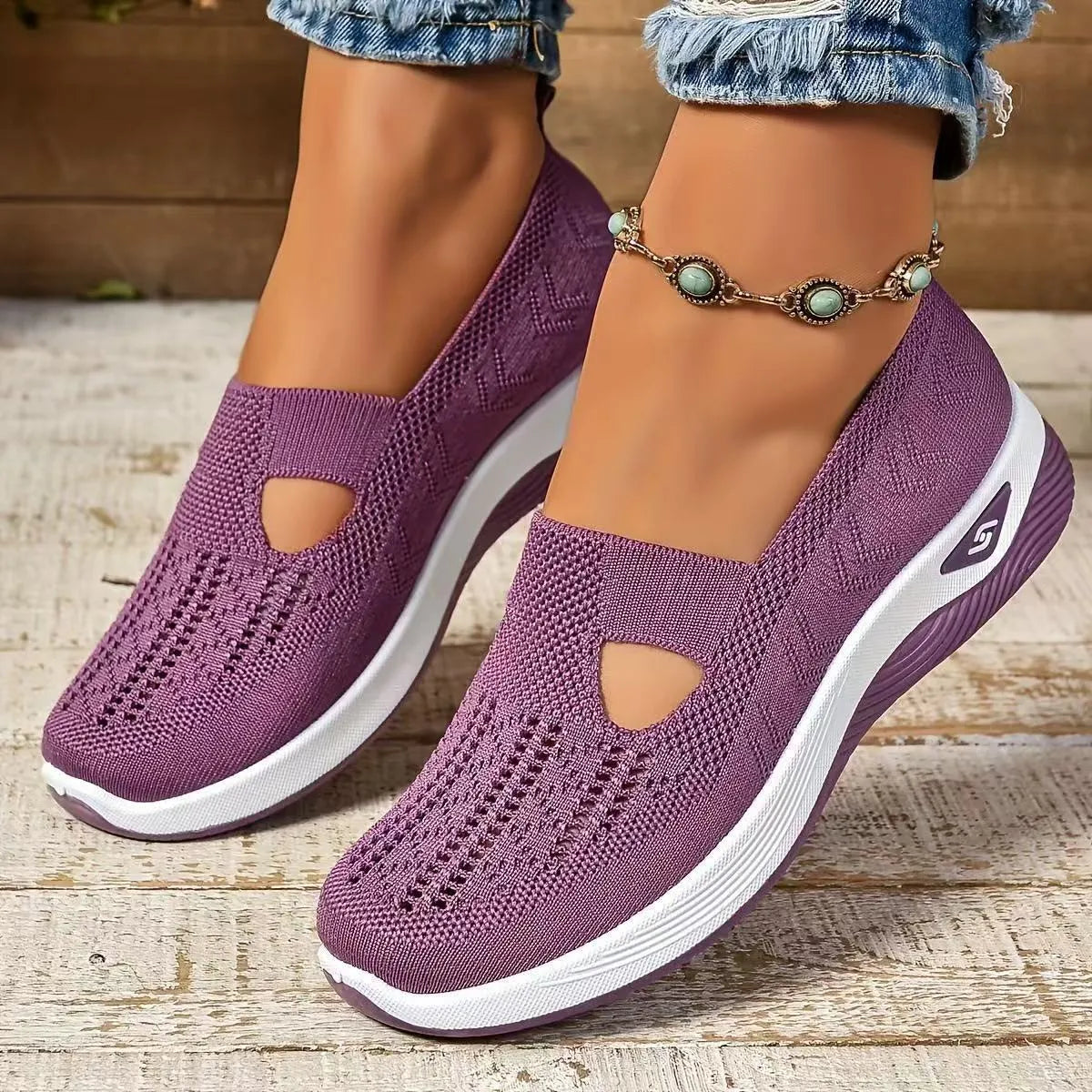 Women's casual mesh shoes with T-strap in various colours showing round toe and flat heel design