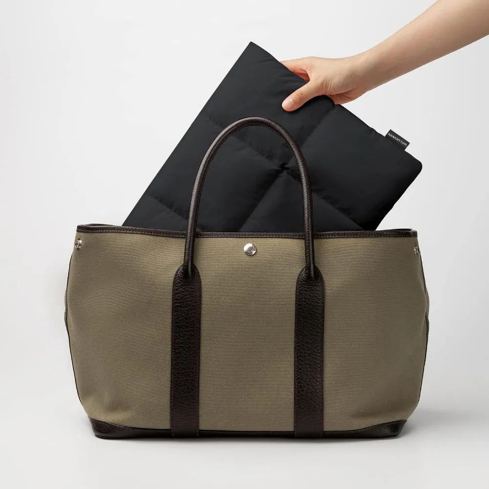 Soft fluffy polyester laptop sleeve case in black or khaki for 13 to 15.6 inch laptops.