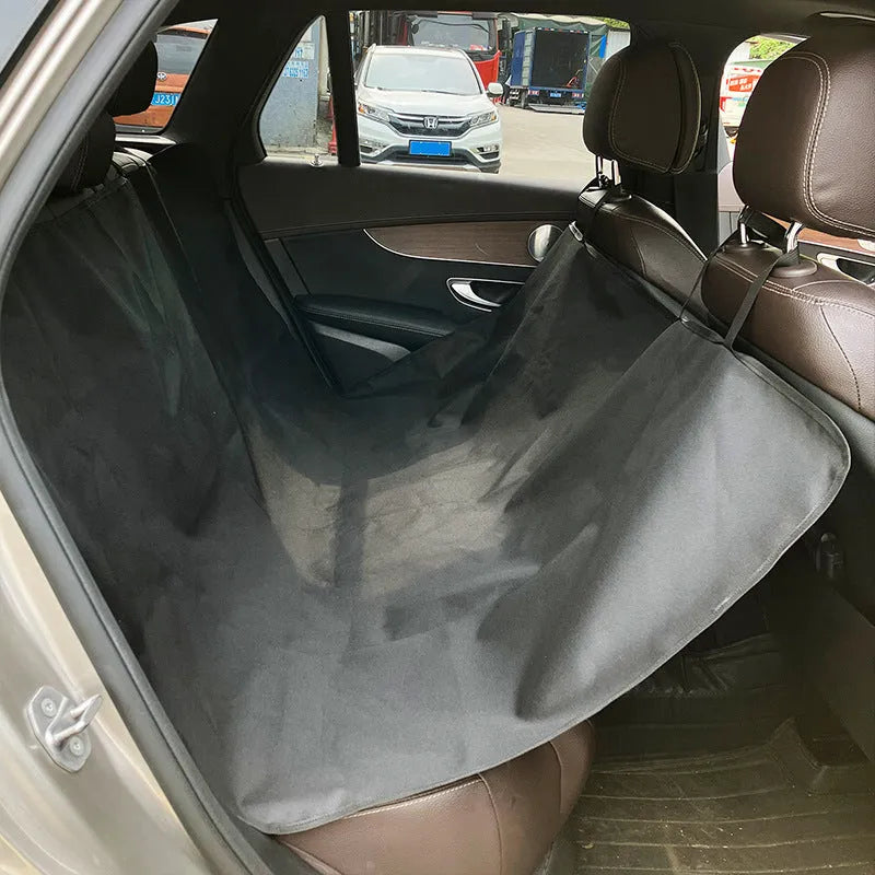 Car pet mat covering rear seat with water resistant cloth material in choice of colours and paw print designs