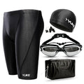 Men's black five-piece swimming set with trunks, anti-fog goggles, waterproof cap, ear plug nose clip, and storage bag