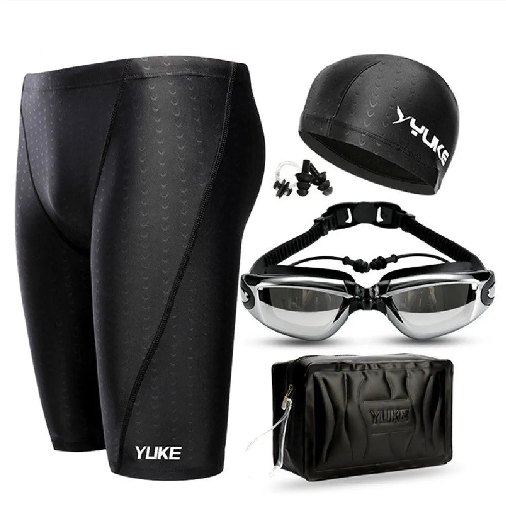 Men's black five-piece swimming set with trunks, anti-fog goggles, waterproof cap, ear plug nose clip, and storage bag