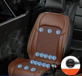 Ventilated car seat cooling cushion with fan grid, plugged into a 12V cigarette lighter socket.