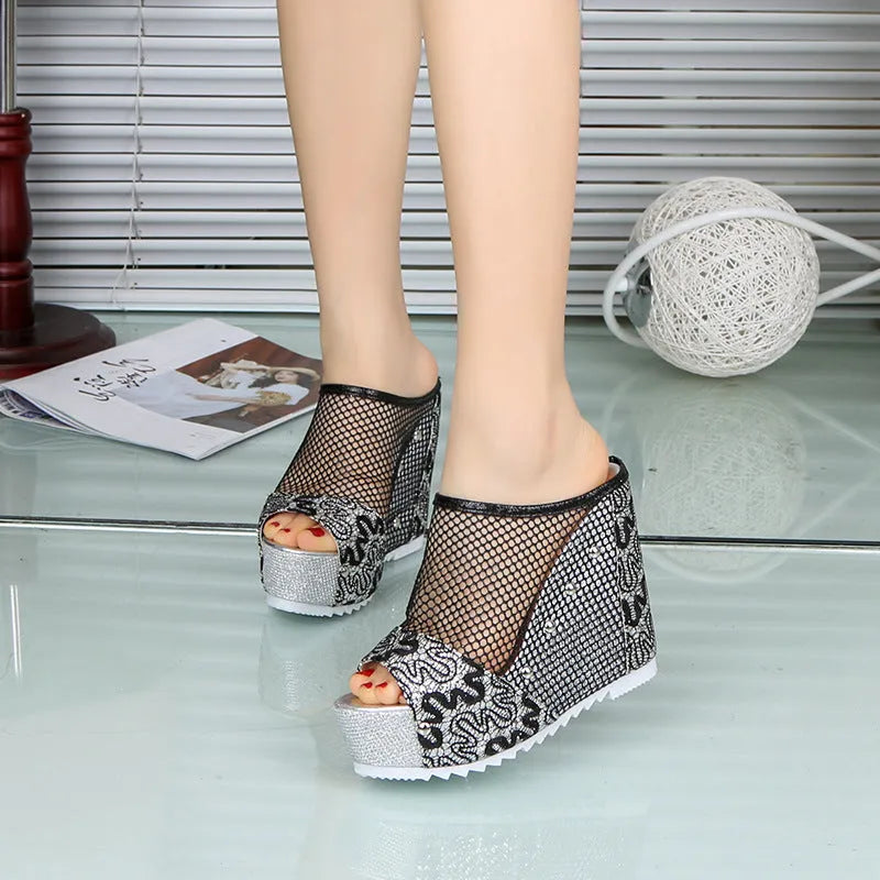 Korean platform flip-flops with a hollowed-out heel, chunky sole, and mesh lace-up upper in black colour.