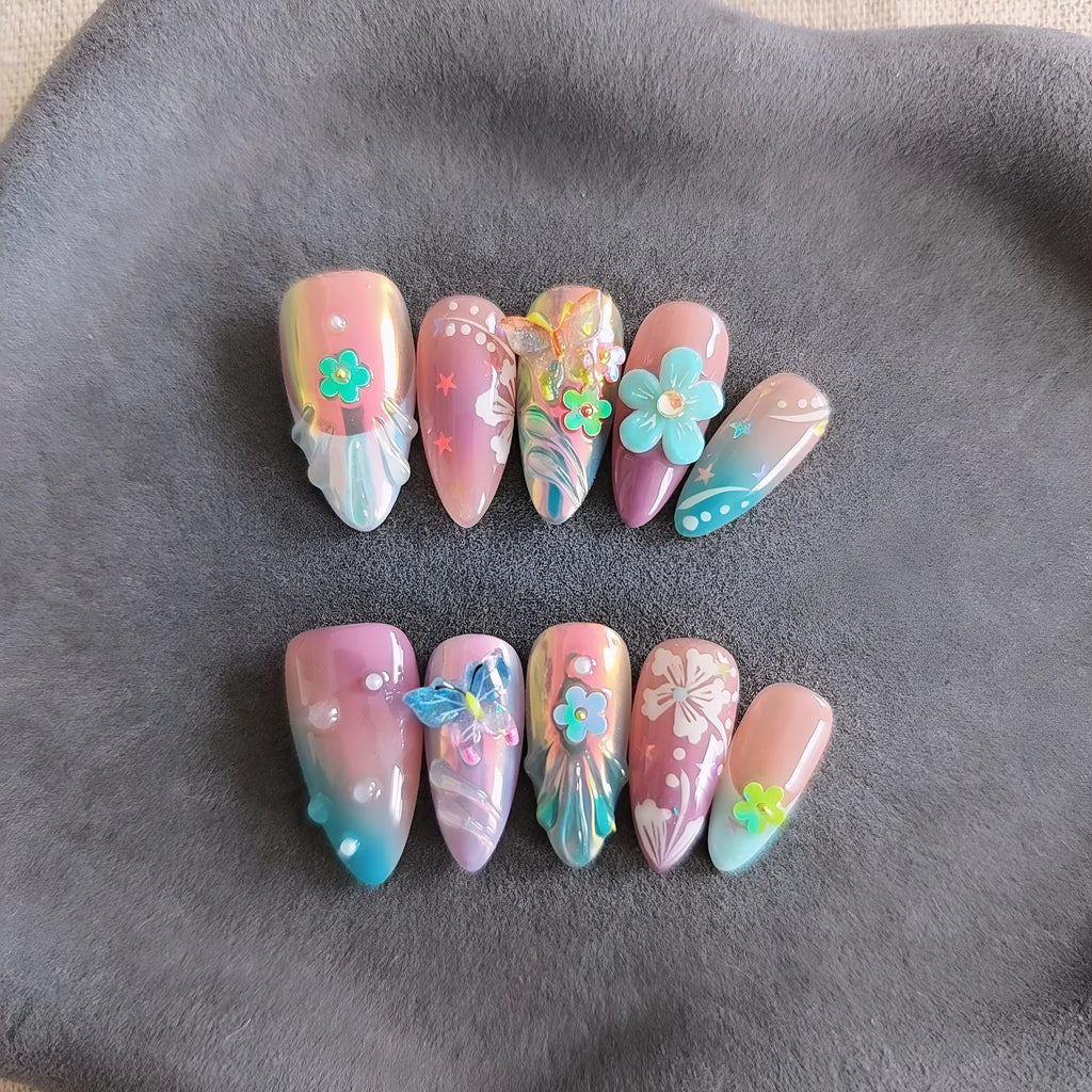 Handmade colourful nail art sculptures with embossed flower and butterfly patterns in four sizes