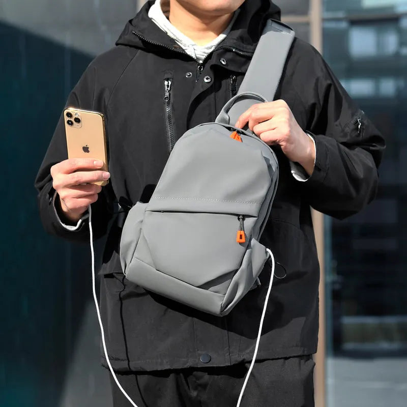 Men's black polyester crossbody bag with waterproof coating and shoulder strap