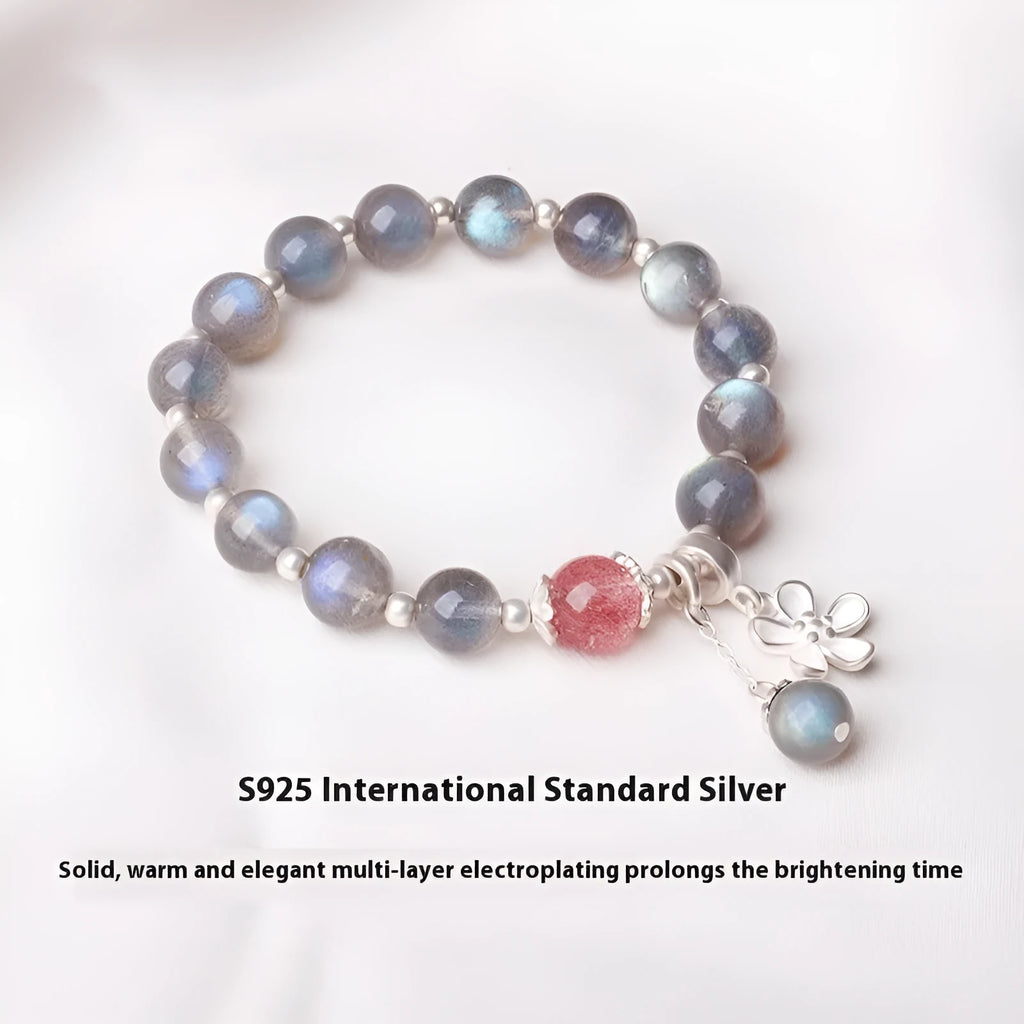 Women's silver bracelet with 7.5mm gray moonlight stone and zodiac design.
