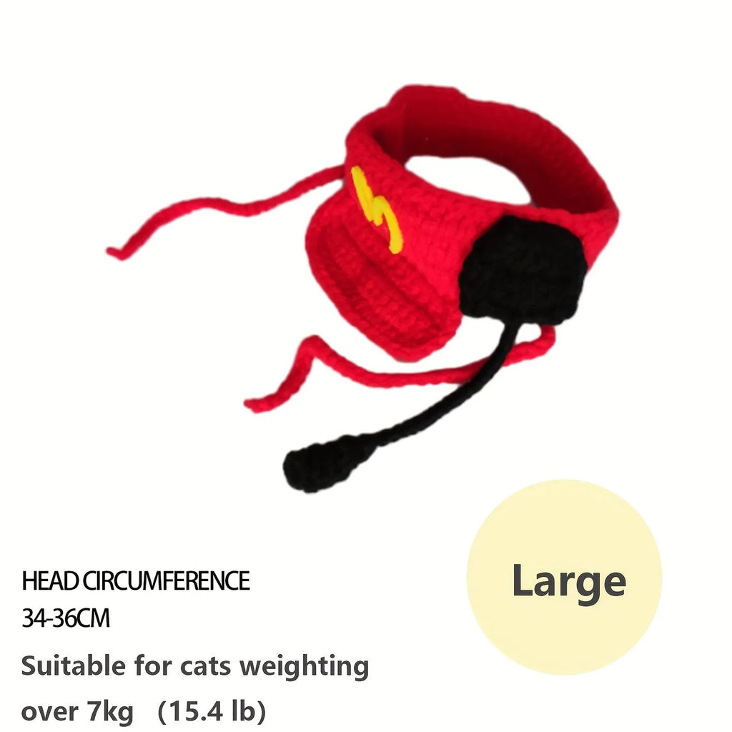 Handmade chef hat and cotton knitted sweater on a small cat for a birthday costume