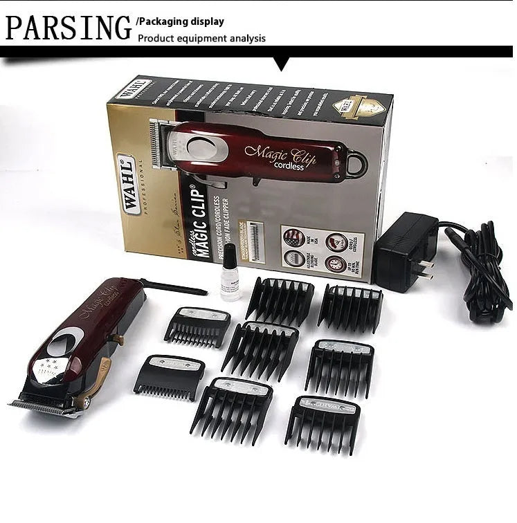 Charging hair clipper with stainless steel cutter head on a white background